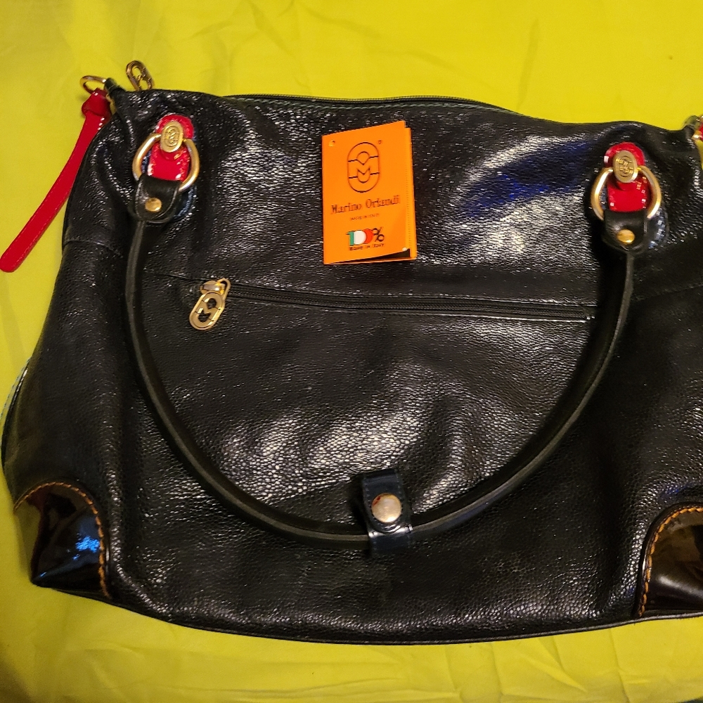Authenticated Marino Orlandi leather purse
